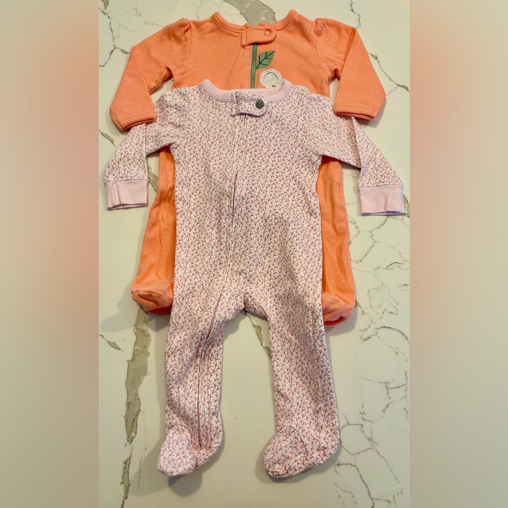 Set of 2. Girls 0-3 month footie pajamas.